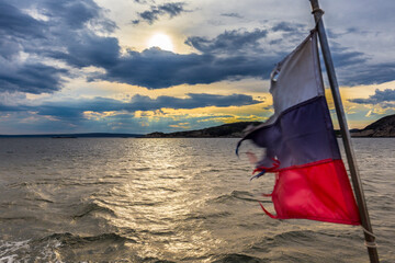 Beautiful seascape with russian flag, Barents sea.