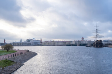 Beautiful photos of St. Petersburg: the Neva river, the cruiser Aurora, the promenade, against a...
