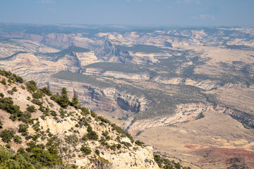 Fototapeta na wymiar Scenic overlook of the canyon at Dinosaur National Monument. Hazy, polluted air