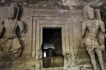 Mumbai, India - October 23, 2018: Interior of a Hindu God sculpture of Elephanta cave, late Gupta dating from between the 9th and 11th centuries, UNESCO World Heritage Site