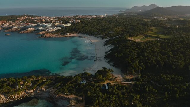 Aerial drone shot in Cala Agulla. Beach in Mallorca, Balearic Island