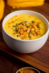Butternut Squash Soup. Classic American Restaurant or Diner favorite. Homemade soup with chicken broth, noodles celery carrots seasoned with salt and pepper and garnished with Italian parsley. 