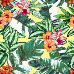 Seamless pattern with banana leaves, orchids, hibiscus flowers and calathea leaves on a yellow background. Decorative botanical exotic illustration wallpaper