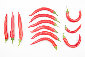 Red hot chili peppers on a white background. food figures. Vitamin vegetable food