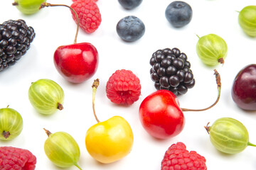 Assorted fresh different berries on a white background. useful vitamin healthy food fruit. healthy vegetable breakfast