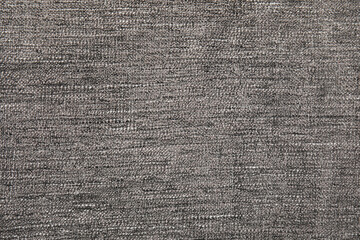 Fototapeta na wymiar Soft warm grey plaid as background, closeup
