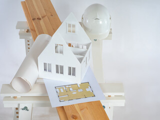 House layout next to the architectural plan. Concept - a workplace of a repairman. Wooden beams on...