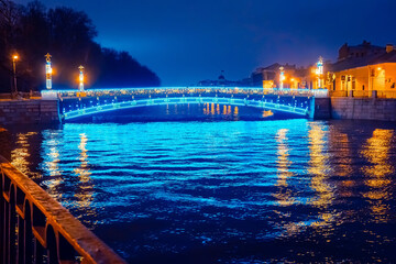 Bridges of Saint Petersburg. Cities of Russia. Christmas illumination on bridge over Neva. Excursions in Saint Petersburg. Russia in the winter evening. New Year in Petersburg. New Year's bridge.