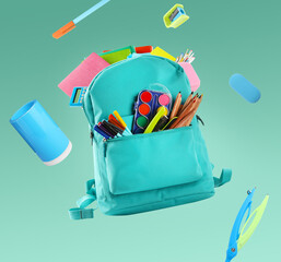 Backpack surrounded by flying school stationery on pale green background