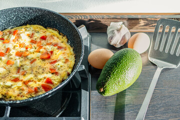 A healthy, dietary omelet with tomatoes, feta cheese and herbs. Healthy food. Slimming.