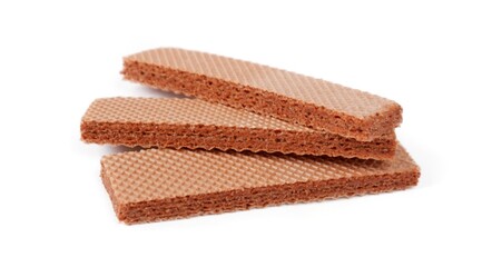 Delicious crispy wafers on white background. Sweet food