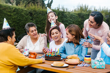 Latin Family happy birthday celebration garden party outside in the backyard in Mexico City