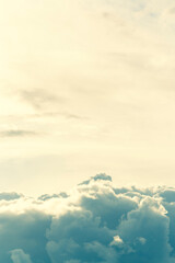 colorful dramatic sky with clouds. toned. above the clouds. beautiful scenic cloudscape background, backdrop. Beauty sunlight sun, stormy fluffy cloud