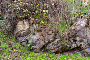 Naklejka na ściany i meble Textured stone background hard surface rock mountain trail
