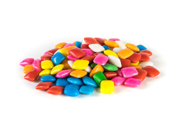 Pile of small shiny square bubble gum pieces