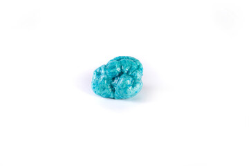 Piece of chewed blue bubble gum isolated over white