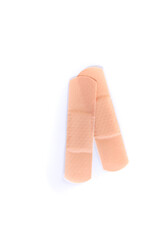 Two pieces of colored bandage strips top down view