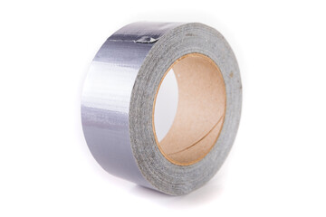 Large roll of silver shiny reflective duct tape isolated over white