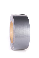 Large roll of silver shiny reflective duct tape standing up isolated over white