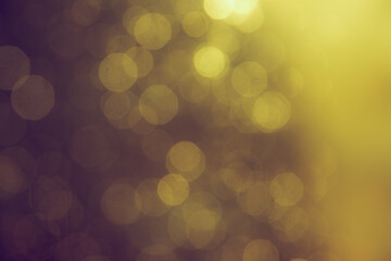 Obraz premium Gold bokeh blur defocus in black backgeound