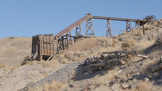 Abandoned Mine Trestle Chute and Ore Bin in Nevada Desert - Shallow Depth of Field