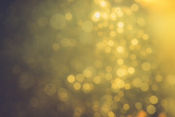Gold bokeh blur defocus in black backgeound
