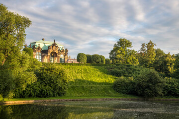 Fototapeta na wymiar Public garden with Zwingergaarden pond in the center of Dresden