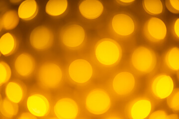 Abstract light yellow bokeh for background.