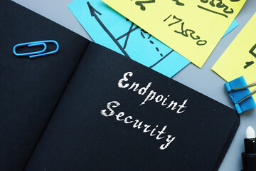 Endpoint Security inscription on the piece of paper.