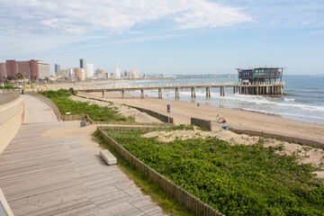 Fototapeta na wymiar View of Pier and Beachfront as Seen from Durban Boardwalk