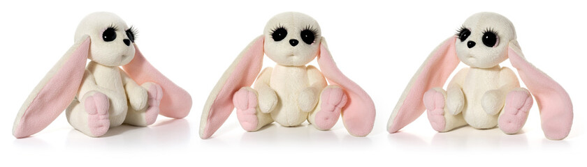 Handmade. Toy white plush hare on a white background. Three positions. Full depth of field