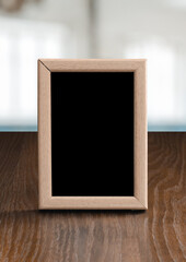 photo frame on the wooden table