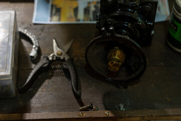 Construction tools on a vintage work bench on a construction site for the restoration of an old ship steamship 