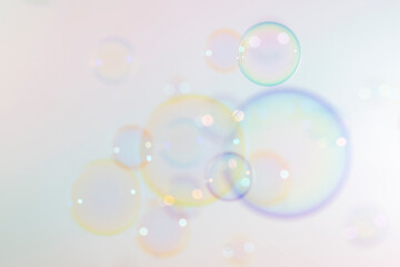 Blur colorful soap bubbles float background.
