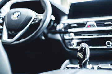 Luxury modern car interior. Automatic gearbox lever; Automatic transmission gearshift stick....