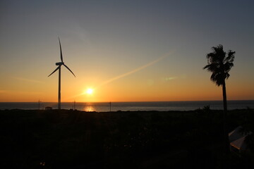 wind turbine at sunset
