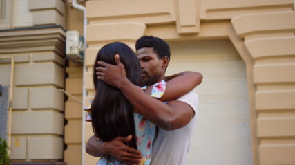 Hot african couple dancing in city. Professional dancers practicing on street