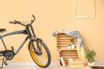 Interior of modern room with bicycle and wooden box