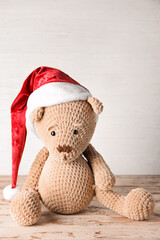 Santa hat with kid toy on table