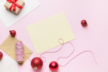 Beautiful Christmas composition with blank card on color background