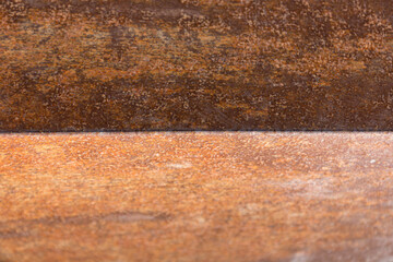 closeup of rusty orange brown weathered Corten steel surface