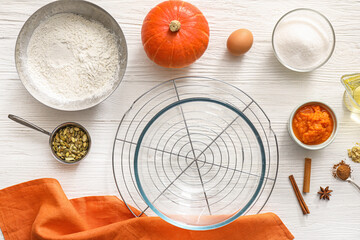 Ingredients for preparing pumpkin pie on table