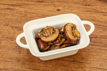 Roasted champignon with herbs and spices