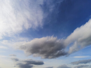 Beautiful white fluffy cloudy sky background,