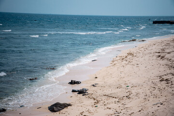 Tropical beach with suny views and waves, rocks and sand background. Travel destinations in Ly Son island, Vietnam  and banner web.