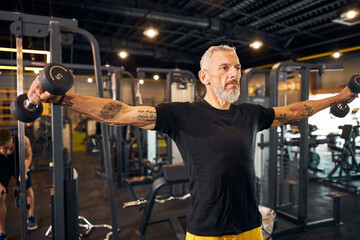 Professional sportsman performing a strength training exercise