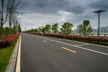 Fototapeta premium Empty urban road and buildings in China