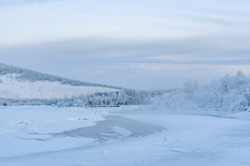 Fototapeta na wymiar View of the Indigirka river in winter