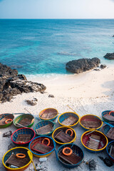 Be island ( small island, Bo Bai island ) with local colorful basket boats at Ly Son island, Quang Ngai Province, Viet Nam