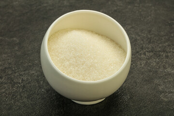 White sugar in the bowl